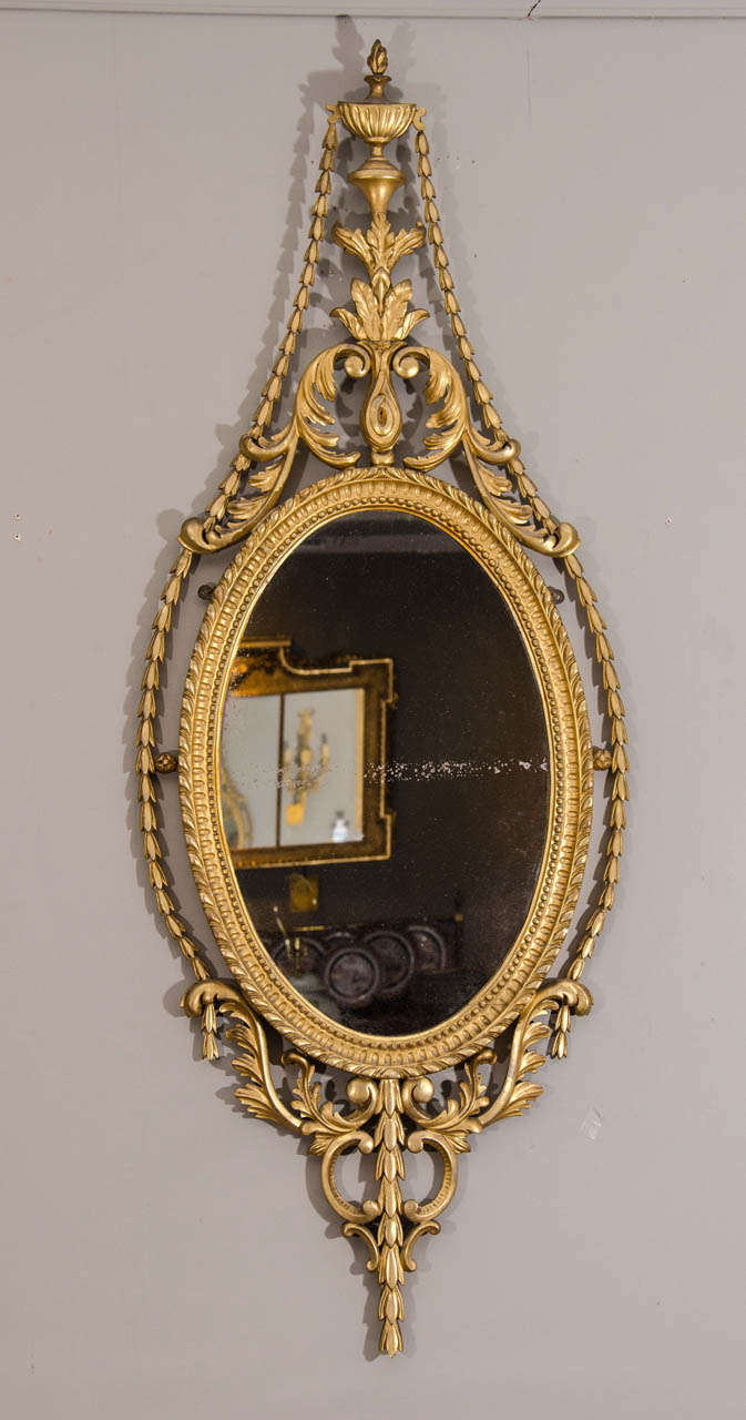 Pair of Late 19th Century English Adam Style Gilt Oval Mirrors In Excellent Condition For Sale In New York, NY
