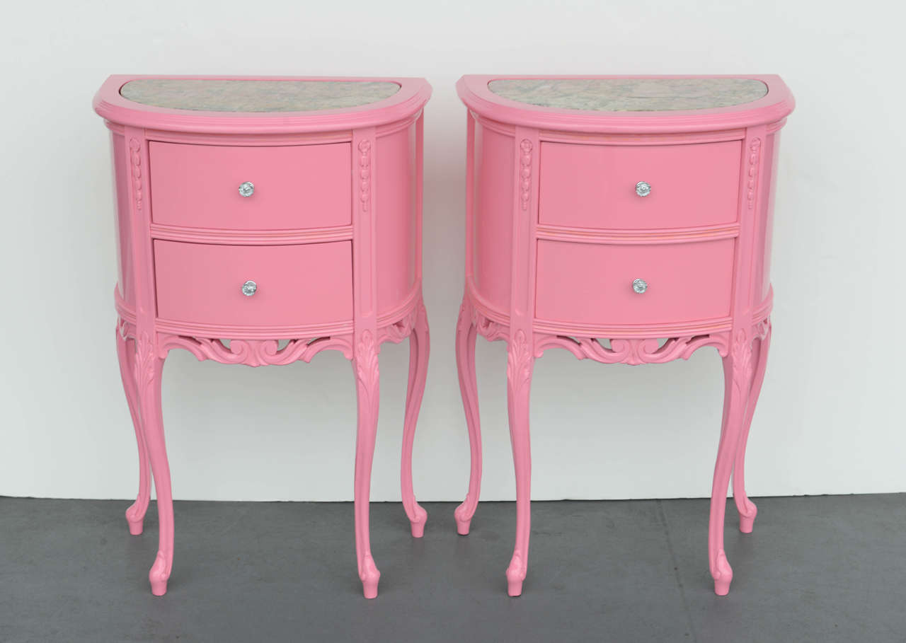 These look absolutely fabulous. Incredible Antique French Marble Top Night Stands, Louis XV Style have been redone in a pink with marble top inlays. Each nightstand has 2 drawers on wood sliders and freshly chromed hardware. Elegant and compact,