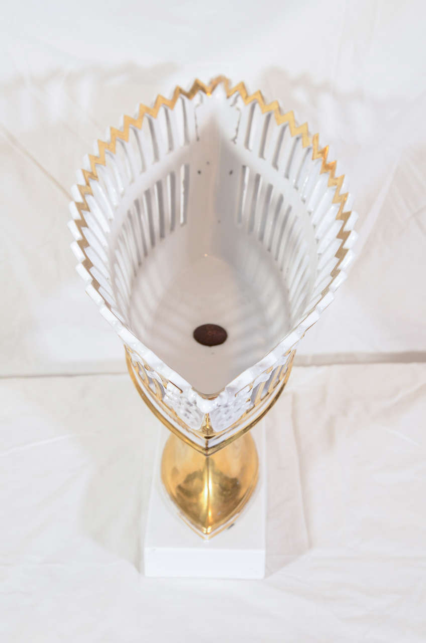 A Large White and Gold Dagoty Pierced Basket 1
