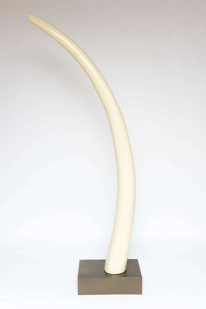 These 6 feet tall faux tusks on iron bases are fantastic accents for any decor.

Base is 10