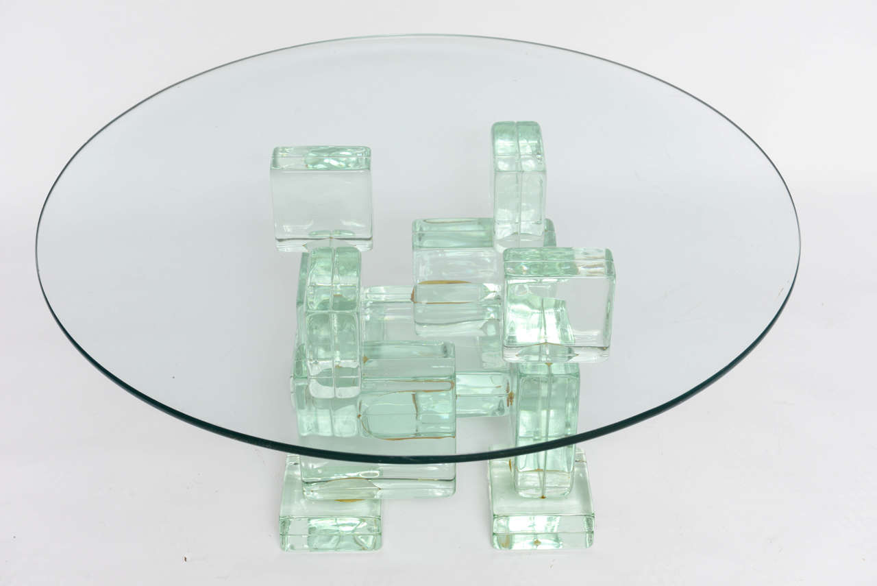 Very vintage and heavy glass block base with glass plateau.
 (One Available)