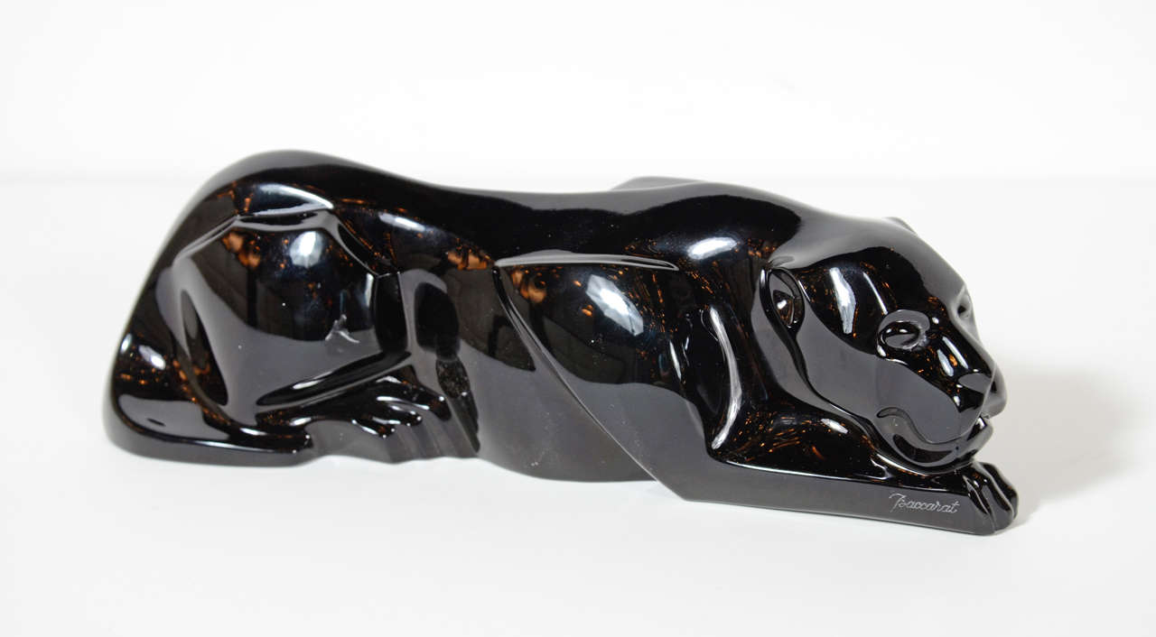 This luxe Baccarat black crystal crouching Panther has a stylized cubist design and is signed Baccarat as well.Would be great on a desk or bookcase as well.