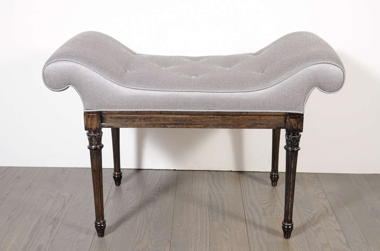 Scroll design with Carved Ebonized Walnut legs with Button Detailing.Newly upholstered in a platinum sharkskin fabric.