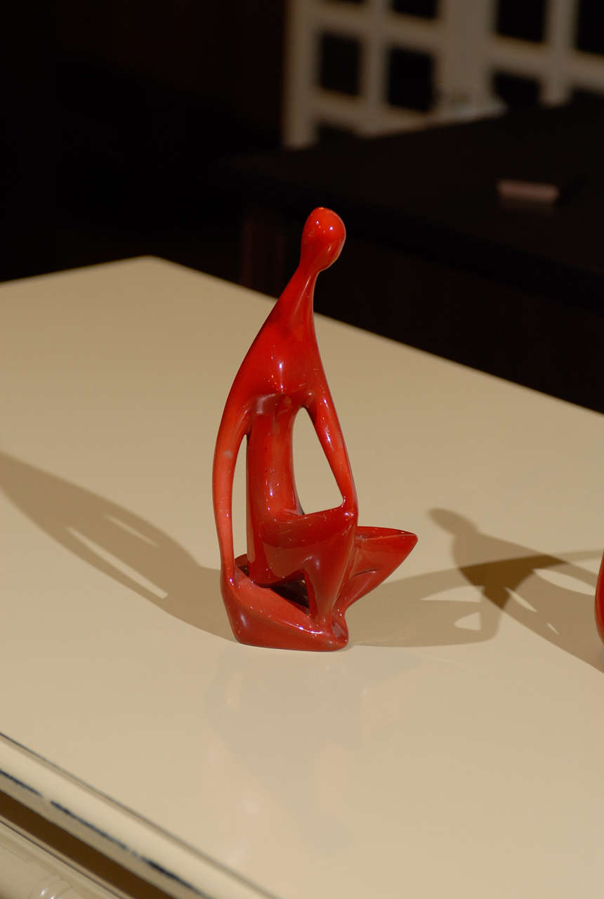 Items from left to right:
Zsolnay red woman JTA-O-BH16-28 $495.
Zsolnay red upright # sold.
Zsolnay red abstract figure JTA-O-BH16-19 $495.