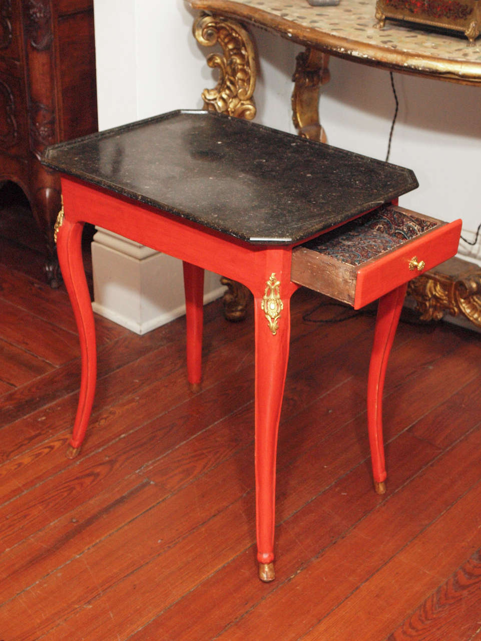 Louis XV transition Small Occasional Table with refreshed red paint and ormolu mounts, one drawer and a trayed fossilized marble top.
