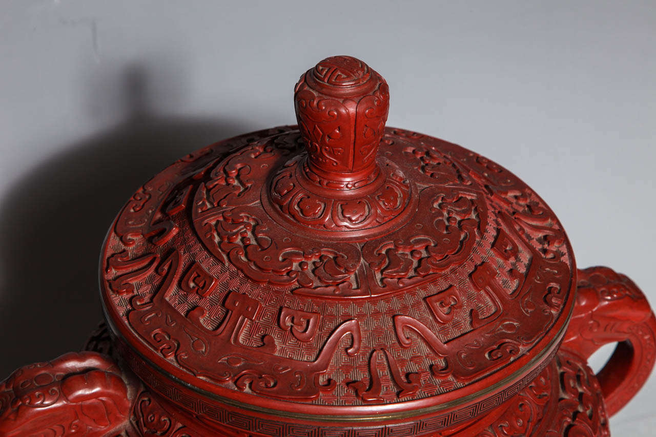 19th Century A Monumental Chinese Cinnabar Red Lacquer Incense Burner of Archaic Form and Decoration