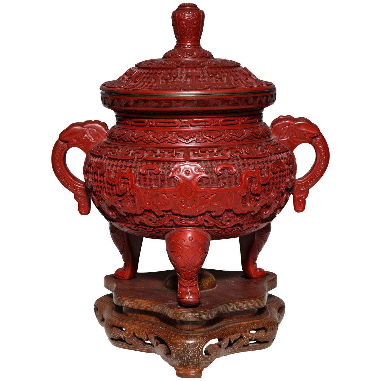 A Monumental Chinese Cinnabar Red Lacquer Incense Burner of Archaic Form and Decoration