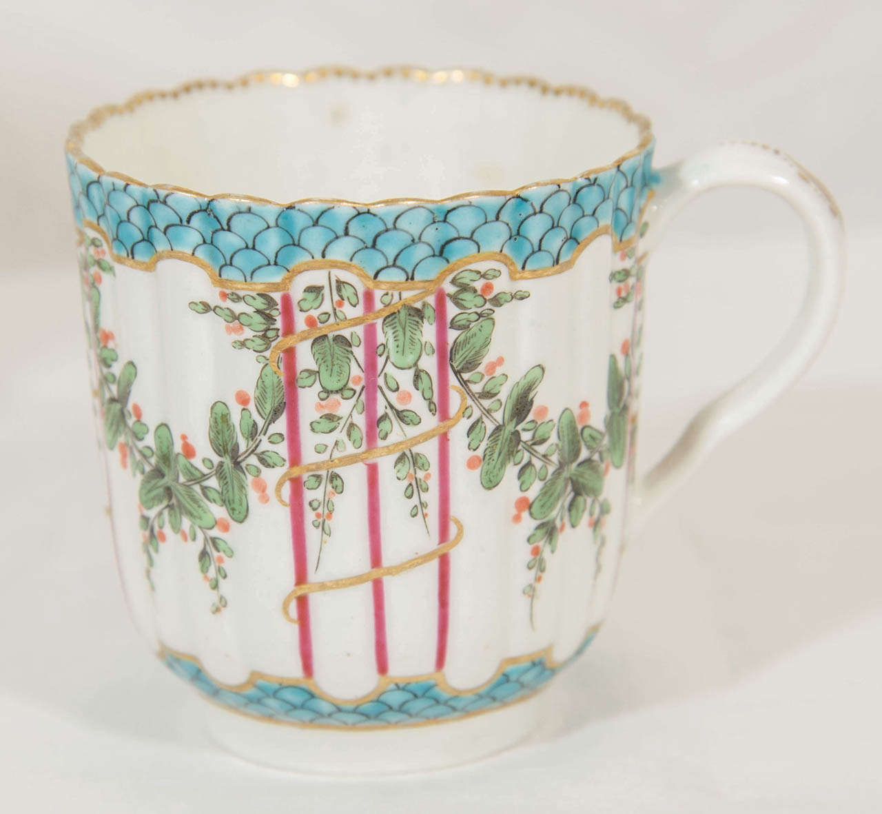 George III An 18th Century Soft Paste Worcester Hop Trellis Pattern Cup and Saucer