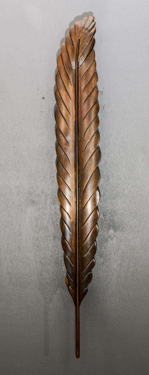 Set of four feather shaped 1960s wall sconces, made of brown patined bronze. Two lights per sconces, new electrification, perfect condition.