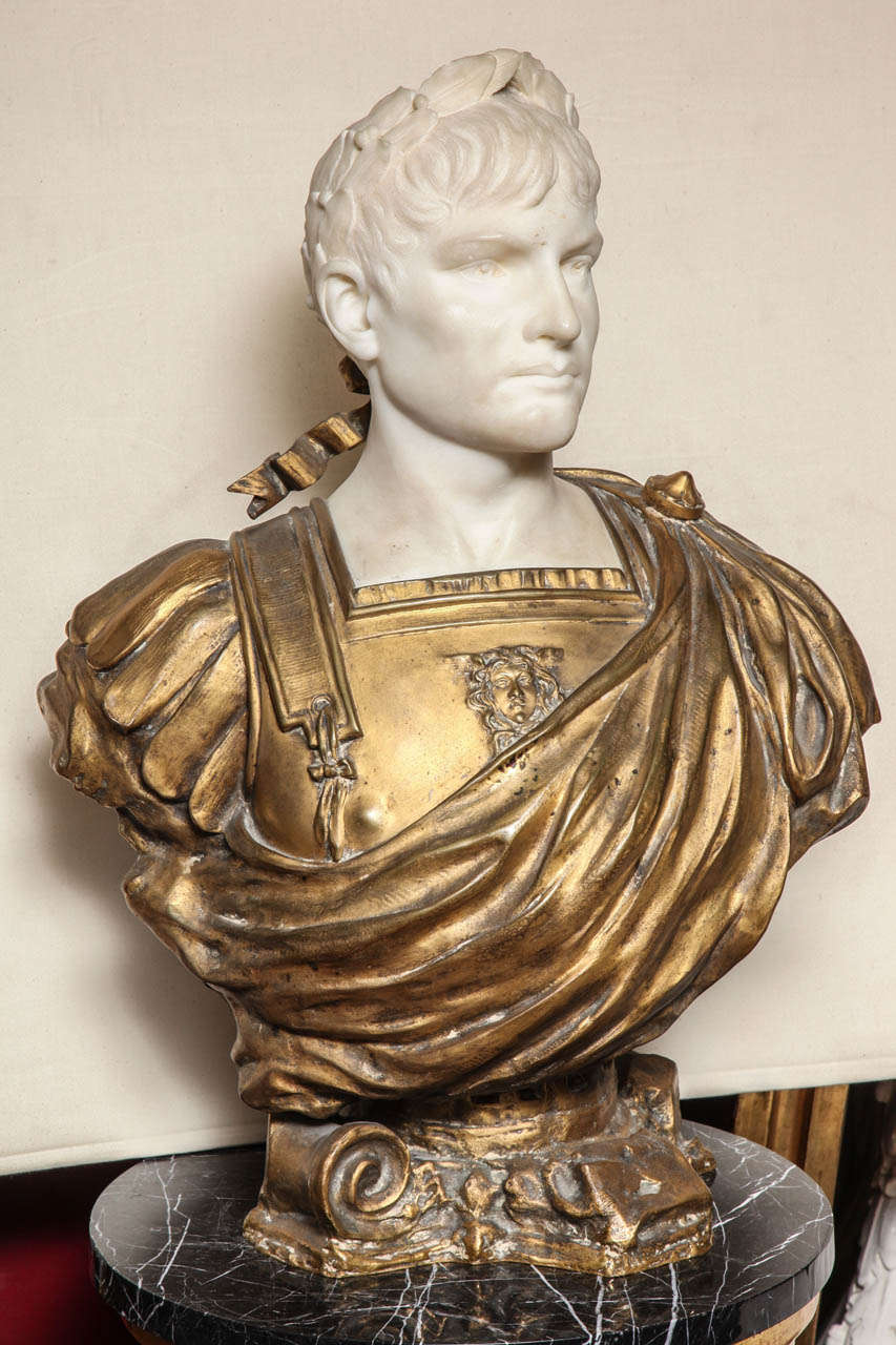 Italian white marble and bronze bust of Augustus Caesar inscribed L. Betti dressed in a toga and with a laurel crown upon his head.
