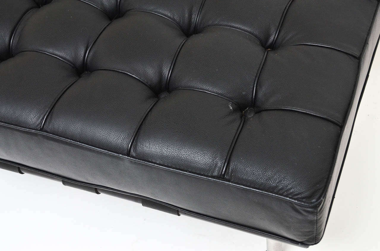 black leather tufted bench