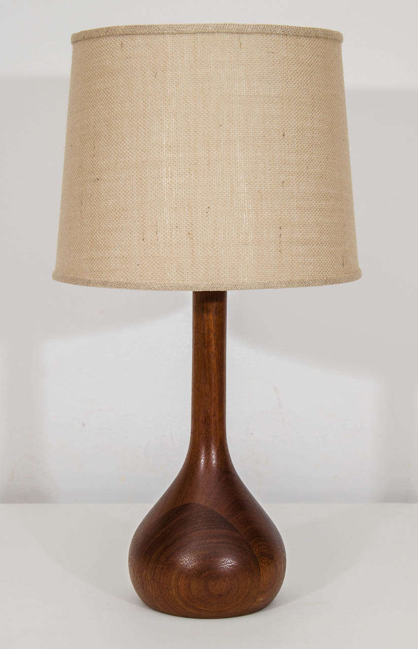 Handsome pair of solid walnut lamps. Nicely done with rounded joinery and expressed grain. Please contact for location.