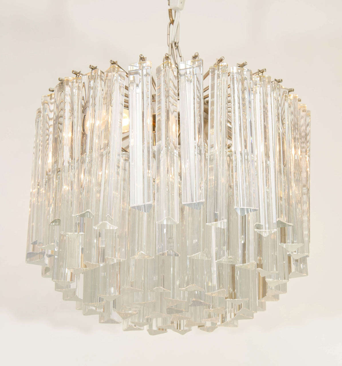 Very pretty, classic Camer crystal chandelier. The round form is is accented by staggered crystals on the perimeter. Another plus is the scale; it is not as big as many in our collection and is quite versatile. Please contact for location.
