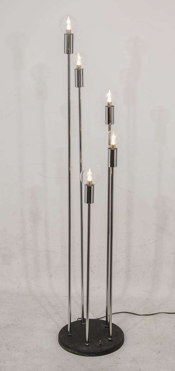 Striking spiral floor lamp with staggered chrome verticals on a weighted black base. Please contact for location. 
