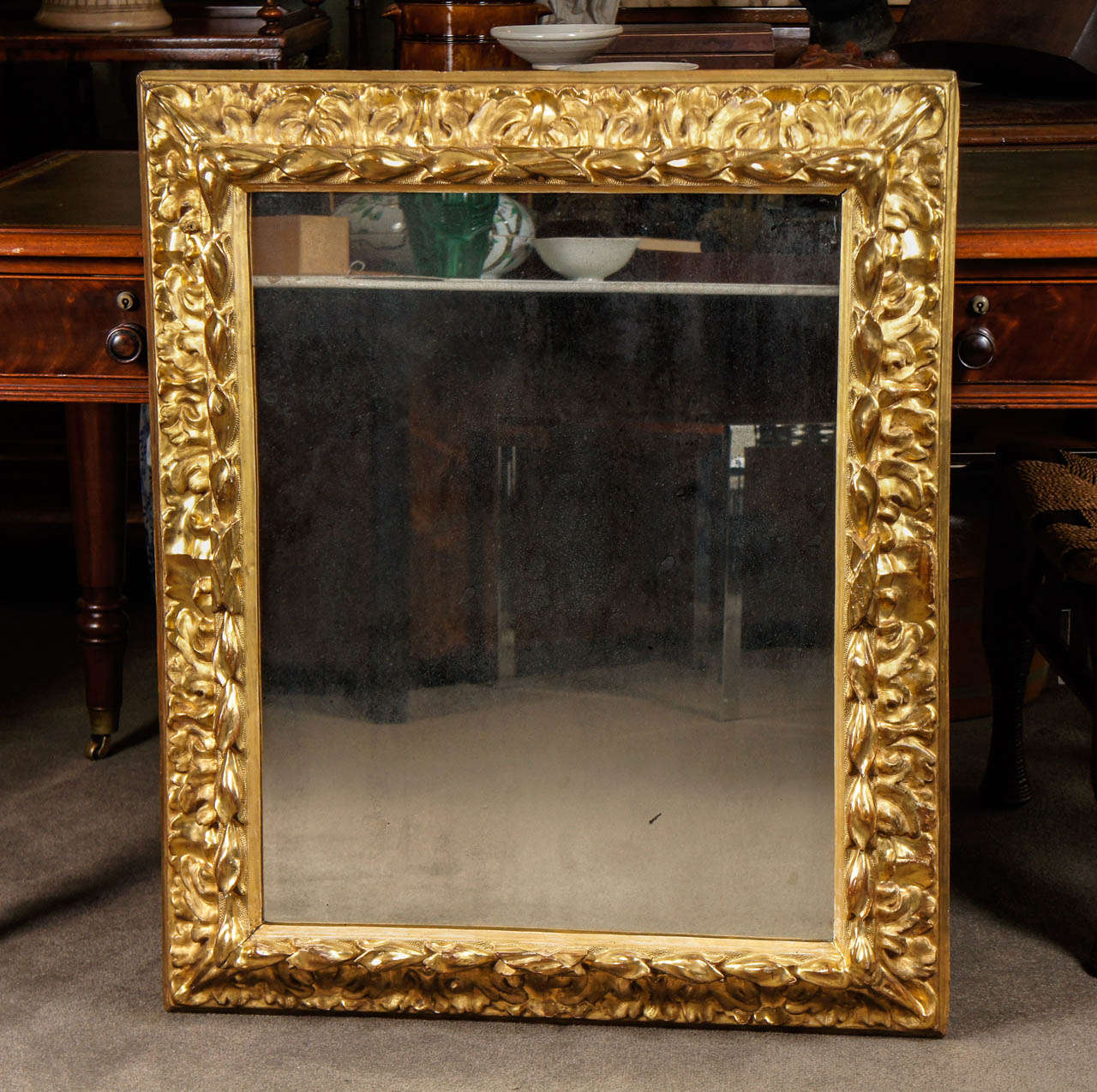 Florentine style superbly carved mirror with original gilt.