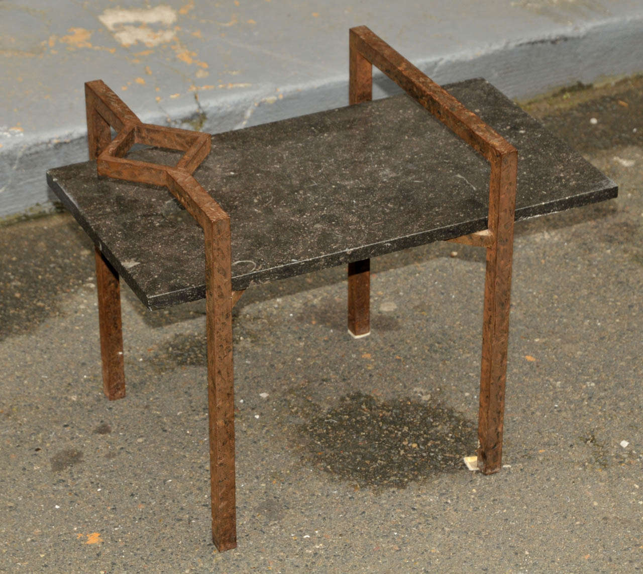 Pair of 1970's end sofa tables in hammered wrought iron and marble. Good condition. Normal wear consistent with age and use.