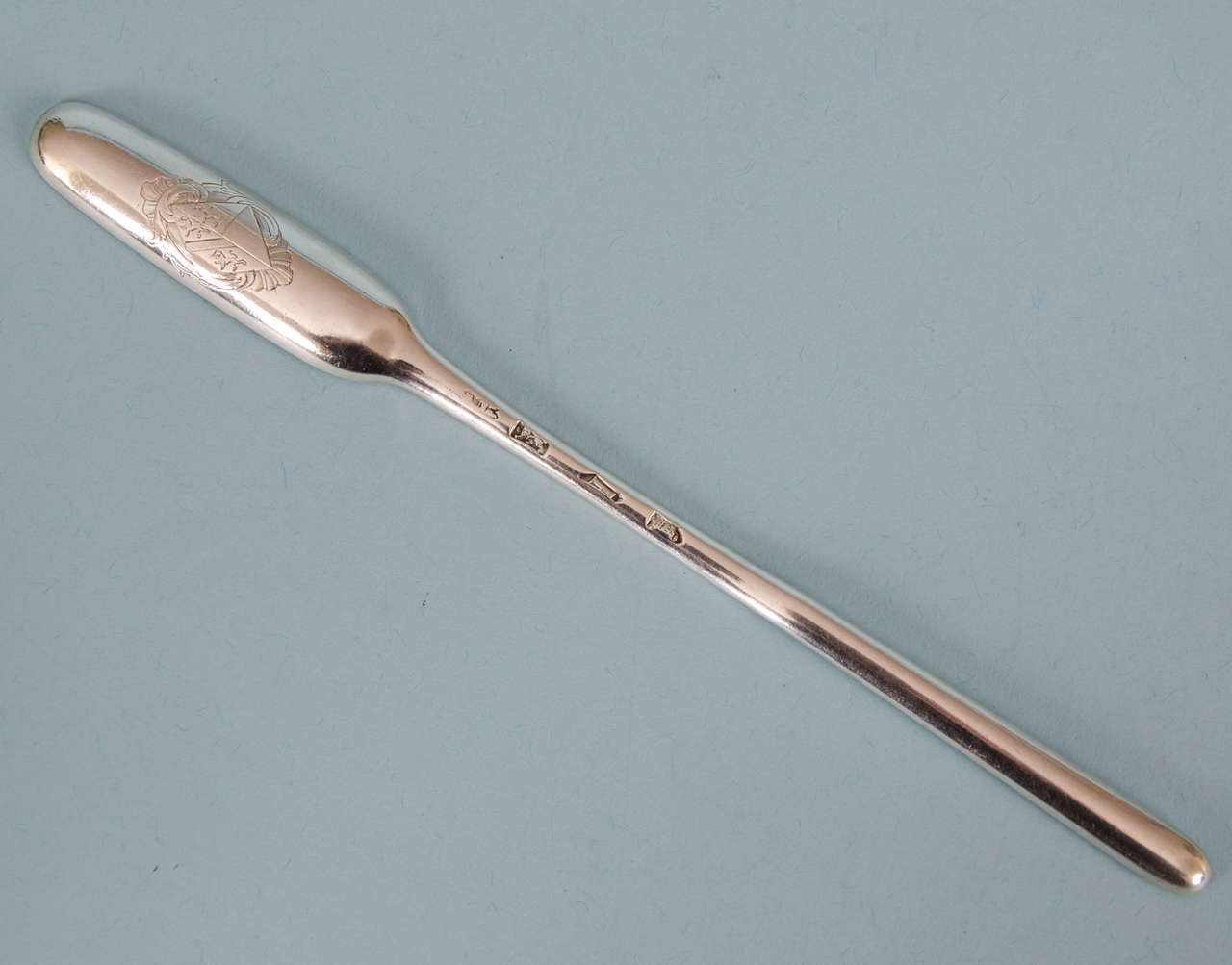 George I sterling silver marrow scoop with an amusing story. 
Maker's mark indistinct. London 1725. 

ARMS: Osborn impaling Byng for the Hon Mrs (Sarah) Osborn (1693-1775). Daughter of the eminent naval officer, George Byng, 1st Viscount