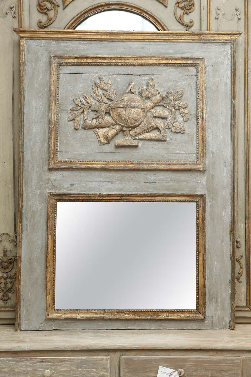 18th century painted French trumeau mirror with gilt detail and later mirror.