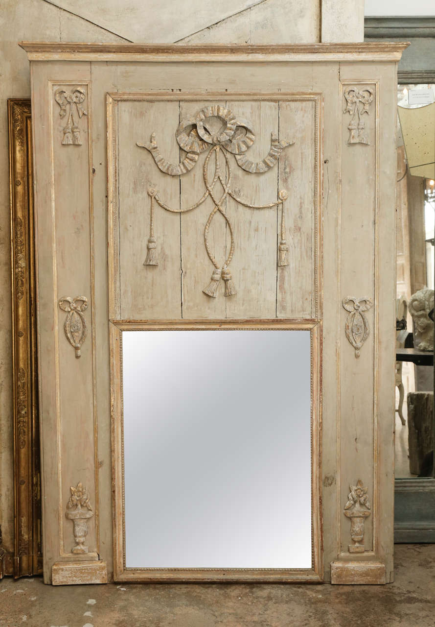 18th century painted restored Neoclassical trumeau with later mirror.