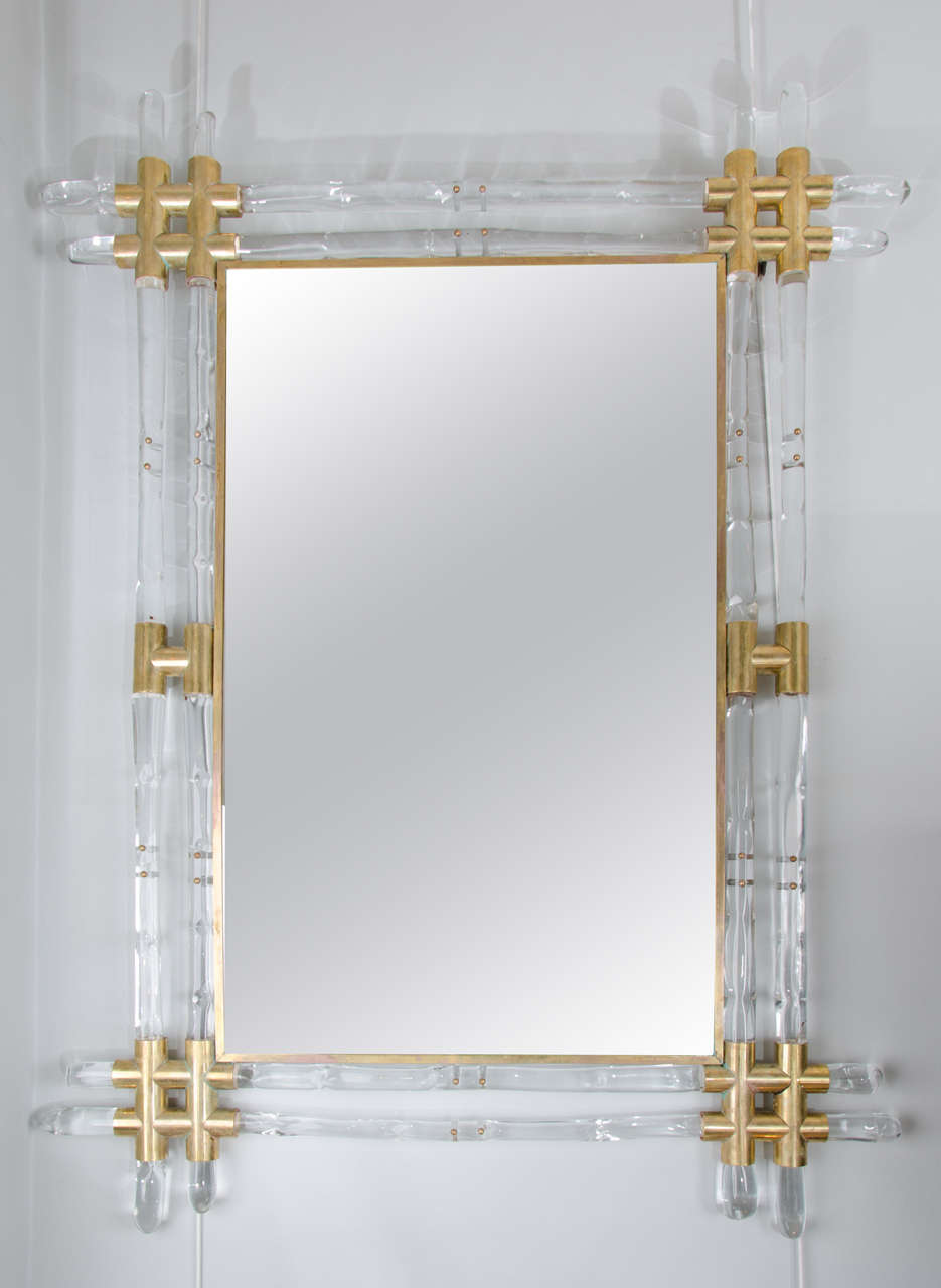 Large pair of 1970s Italian elegant brass edged mirrors with double bamboo shaped glass and brass frame.