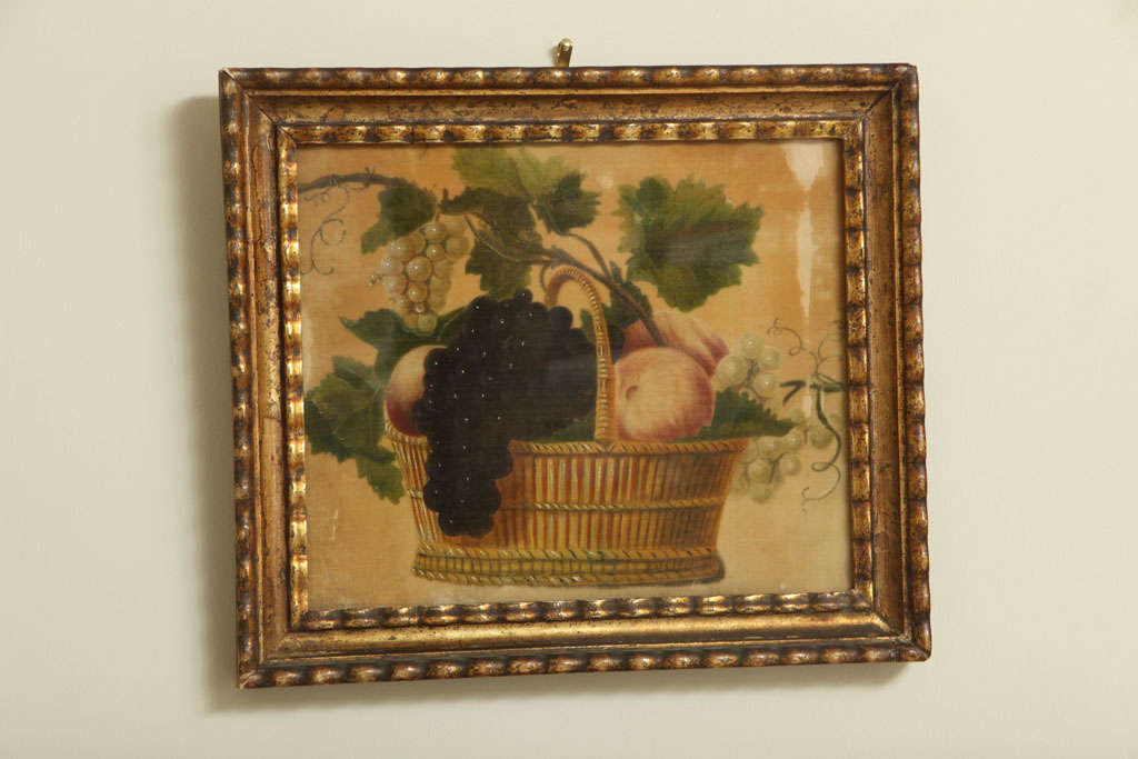 Still life painting of fruit in a basket. Oil on silk.