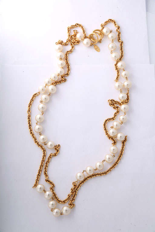 Vintage Chanel Sautoir of pearls and chain.