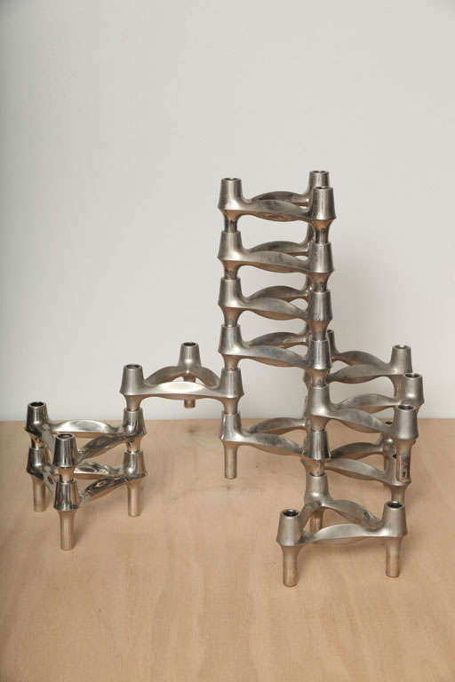 Up to 100 1960's vintage stacking candle holders in chrome manufactured in West Germany. Infinite possibilities of fun and constructive design.