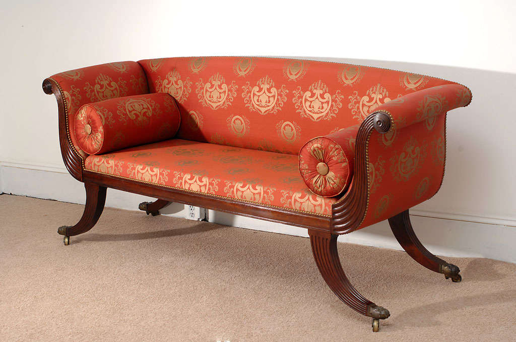 This rare and beautiful sofa is the finest we have ever offered. It is exceptionally graceful in form, yet very 