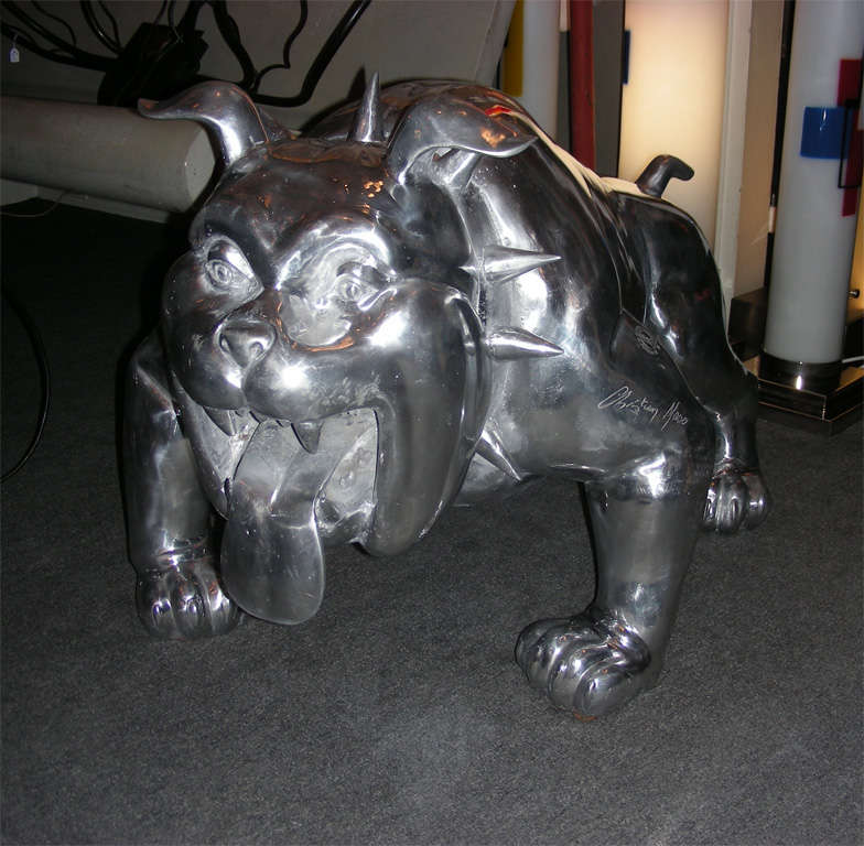 End of 20th century cast aluminum sculpture of a bull dog wearing a pointed collar, by Christian Maas, numbered 19/49.