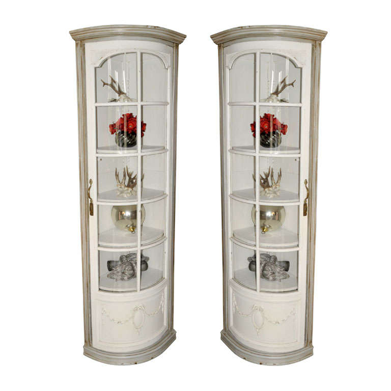 A pair of 19th century French Louis Philippe corner cupboards