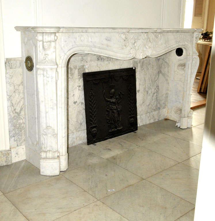 Louis XV An early 19th century French Rococo Carrara marble fireplace / mantel piece