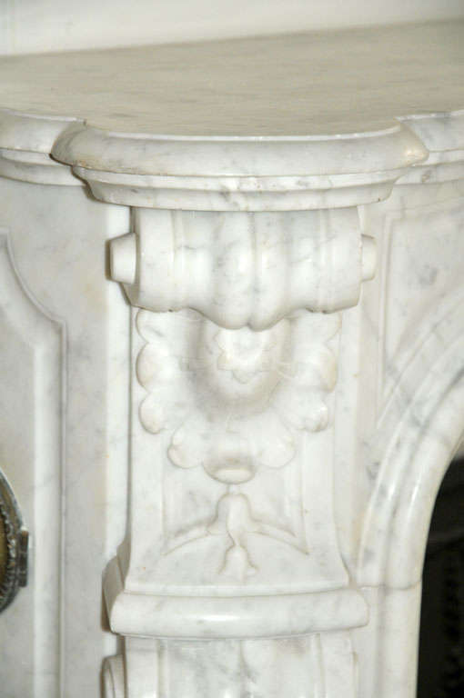 An early 19th century French Rococo Carrara marble fireplace / mantel piece 1