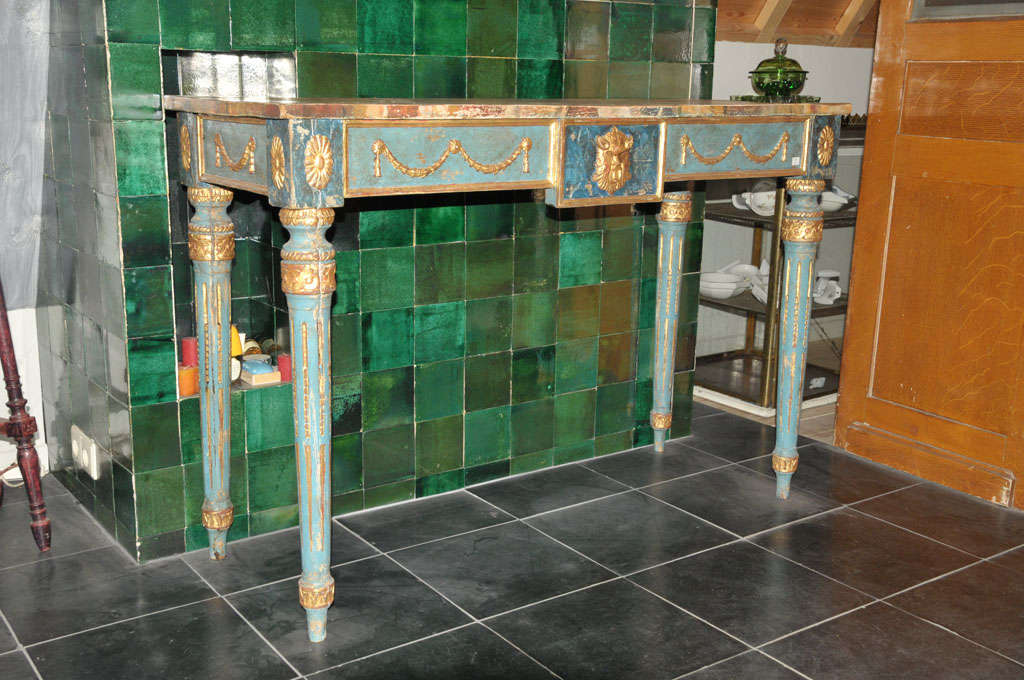 20th Century A decorative Italian Neoclassical painted console table with faux marble top For Sale