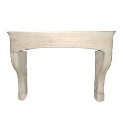 An early 18th C. French Louis XIV / Baroque limestone  fireplace / mantel piece