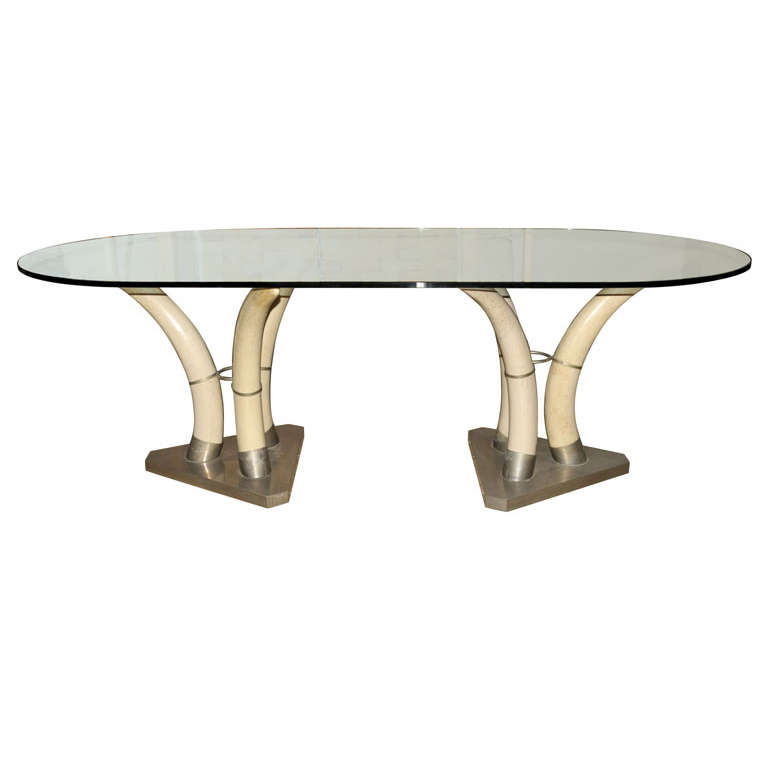 A 1960's French nickeled brass and resin faux tusk dining room table For Sale