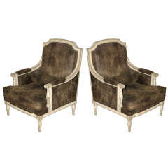 A pair of Louis XVI painted Bergeres