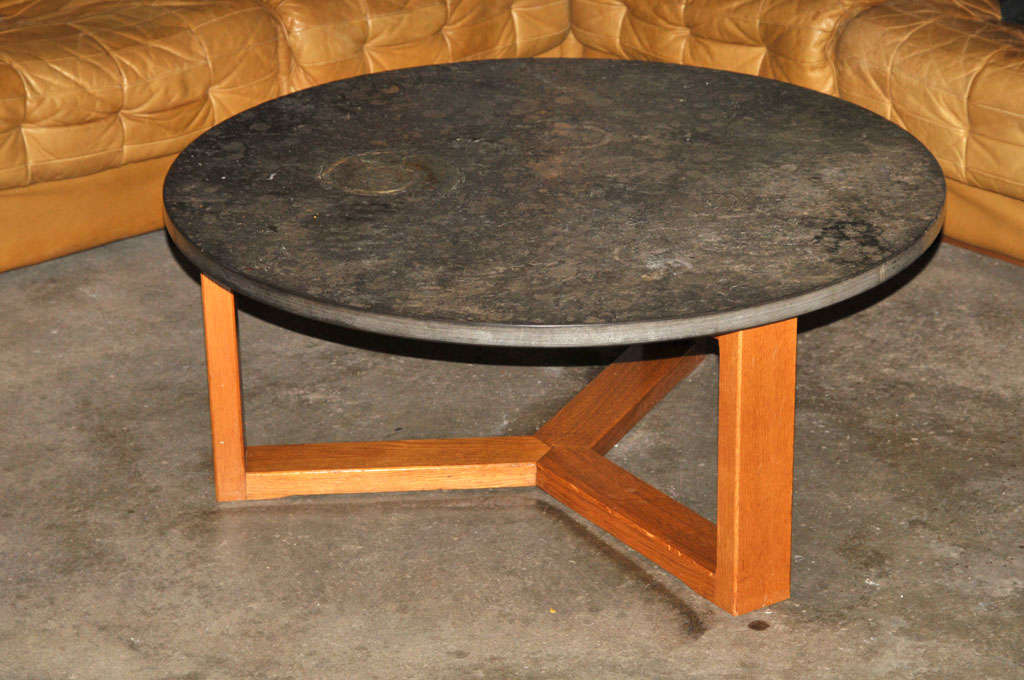 very rare coffee table with an astonishing large pre-historical fossil in the limestone top and various smaller fossils around it. Imported in the 1960's from Brazil by the former owner.