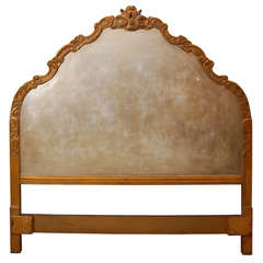 A Carved and Guilded Italian Headboard
