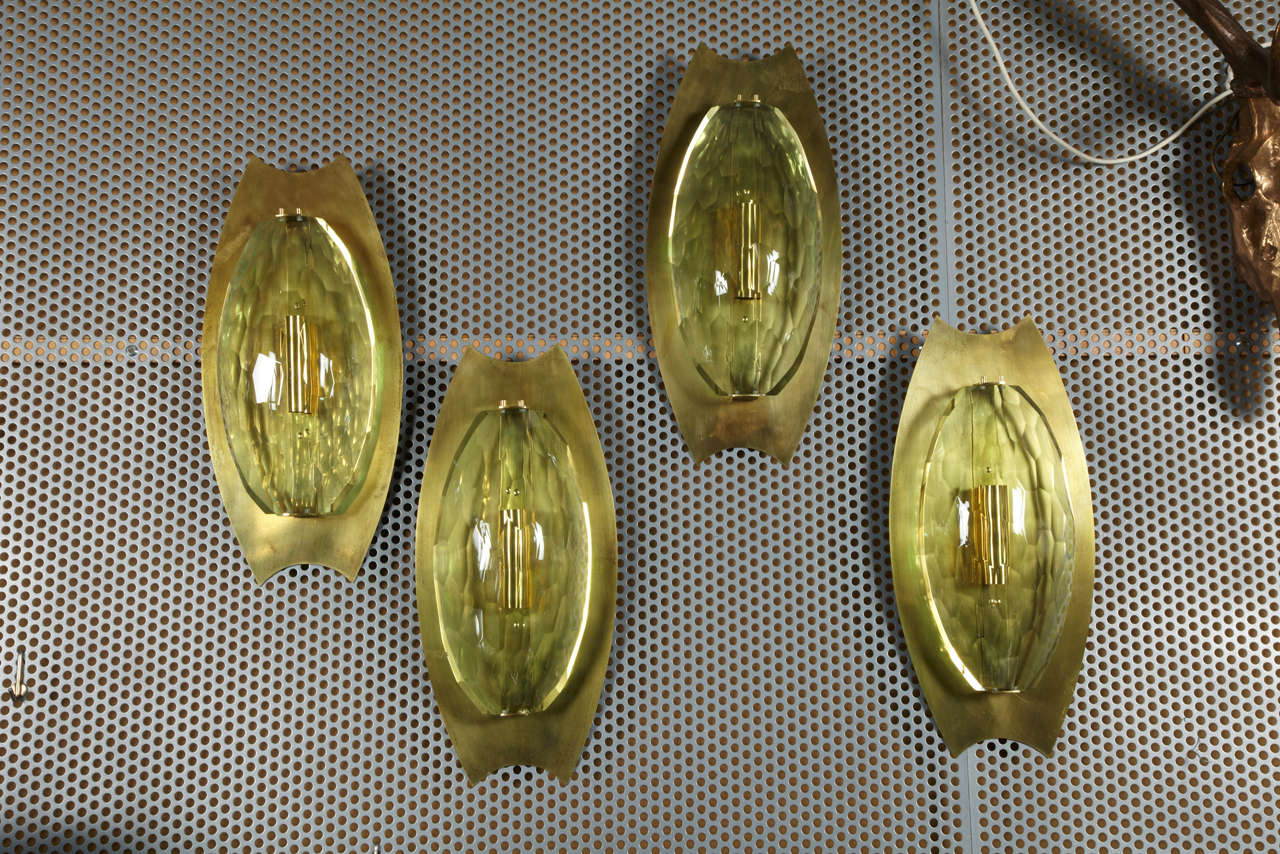 1970s pair of Murano glass sconces
with two lights inside.
Price will be for a pair.