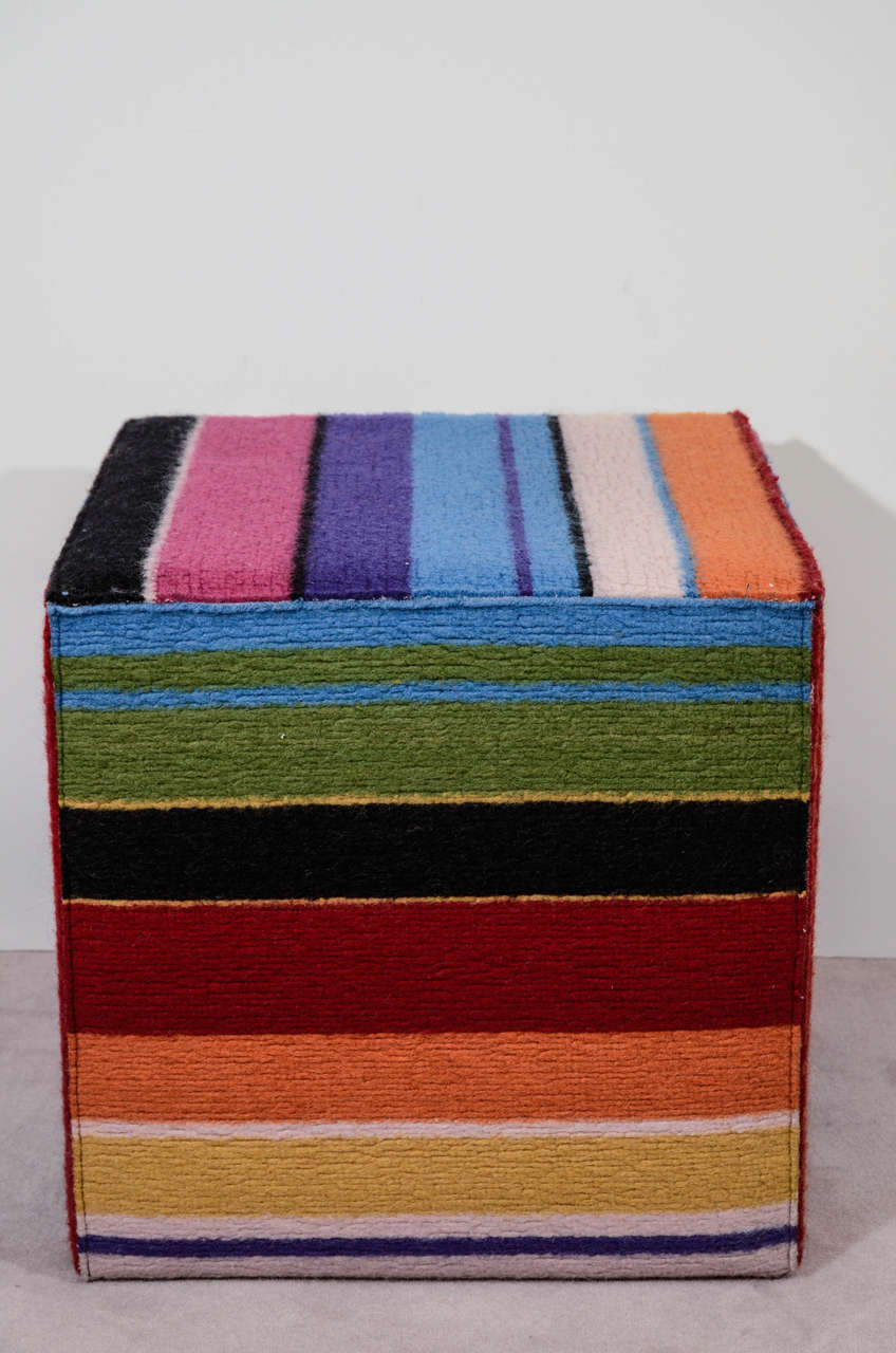 A vintage multi-colored woolen soft sided striped stool by noted Italian designer Missoni. The piece is sturdy enough to double as a side table. The piece is in good vintage condition with age appropriate wear to fabric.

Price reduced from