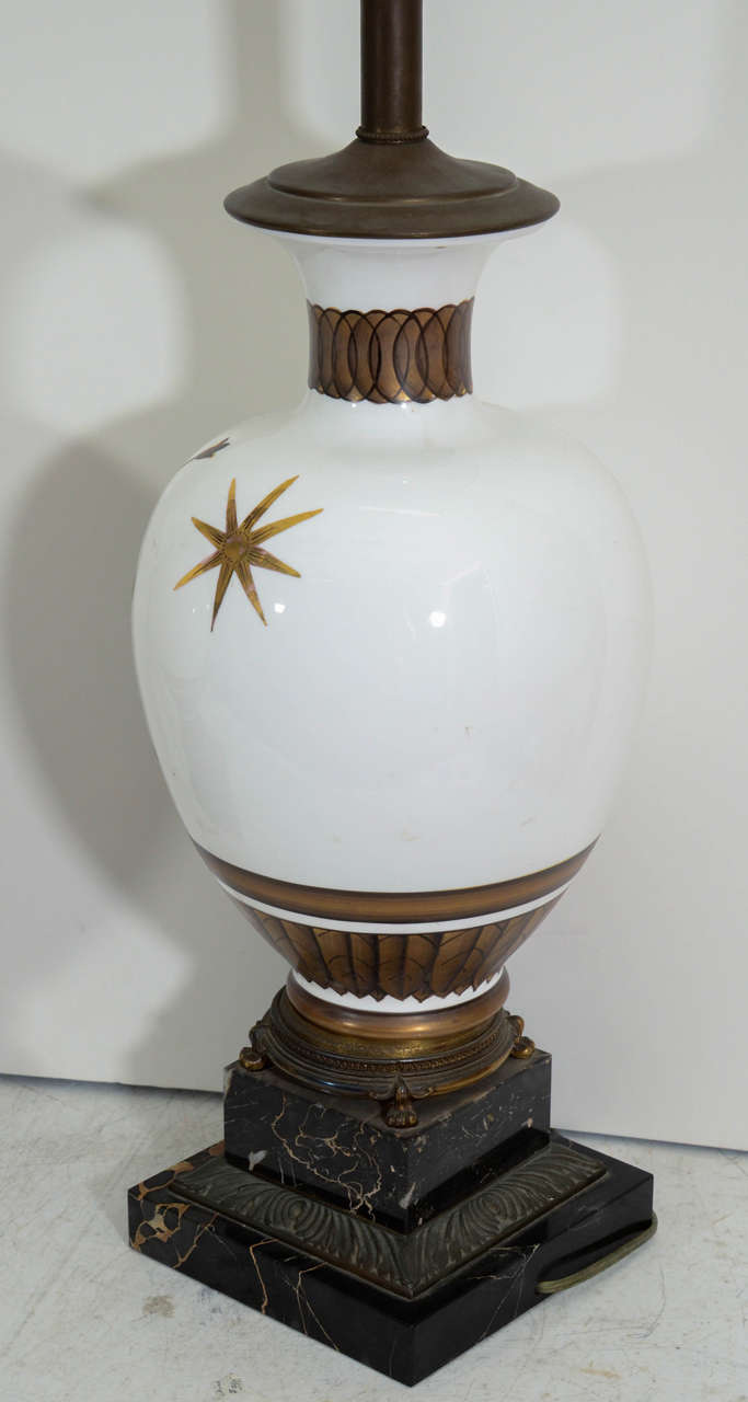 Bronze A Midcentury Pair of Tommi Parzinger Classical Motif Lamps For Sale