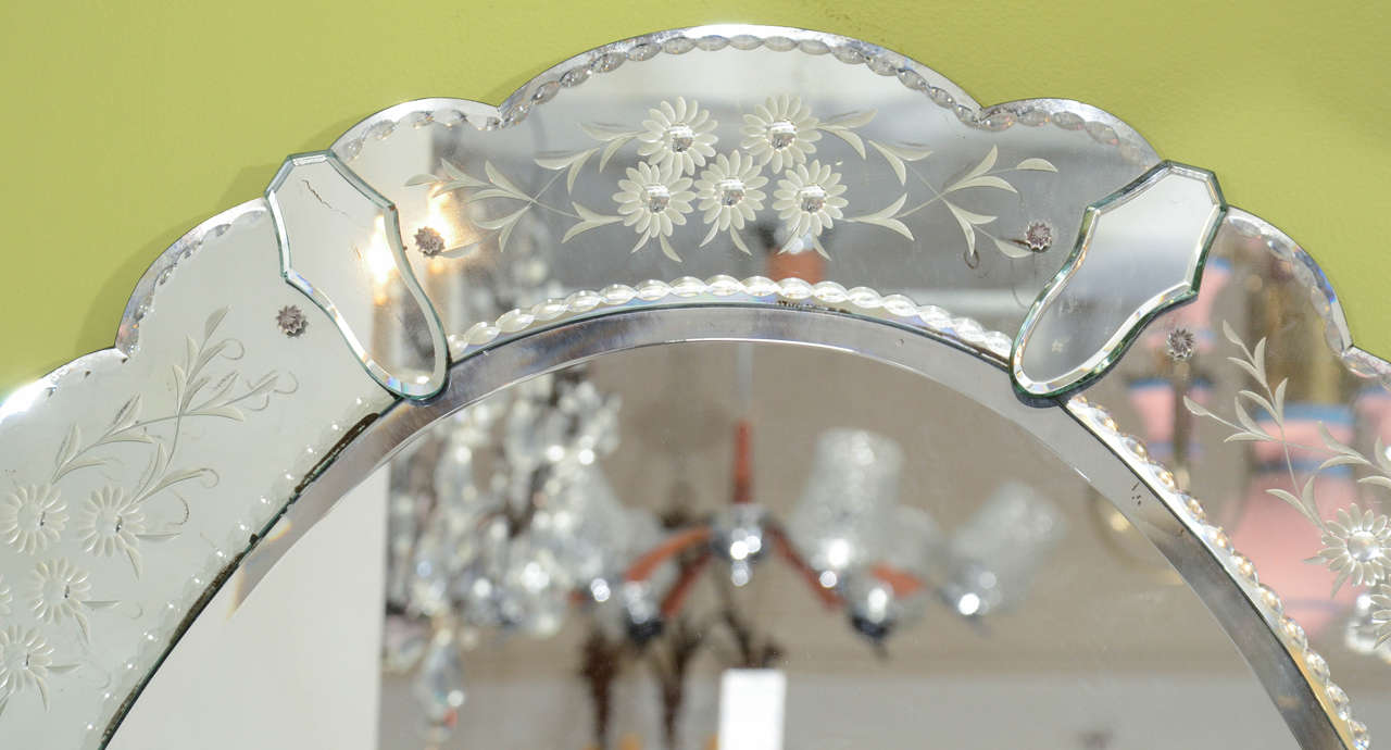 scalloped oval mirror