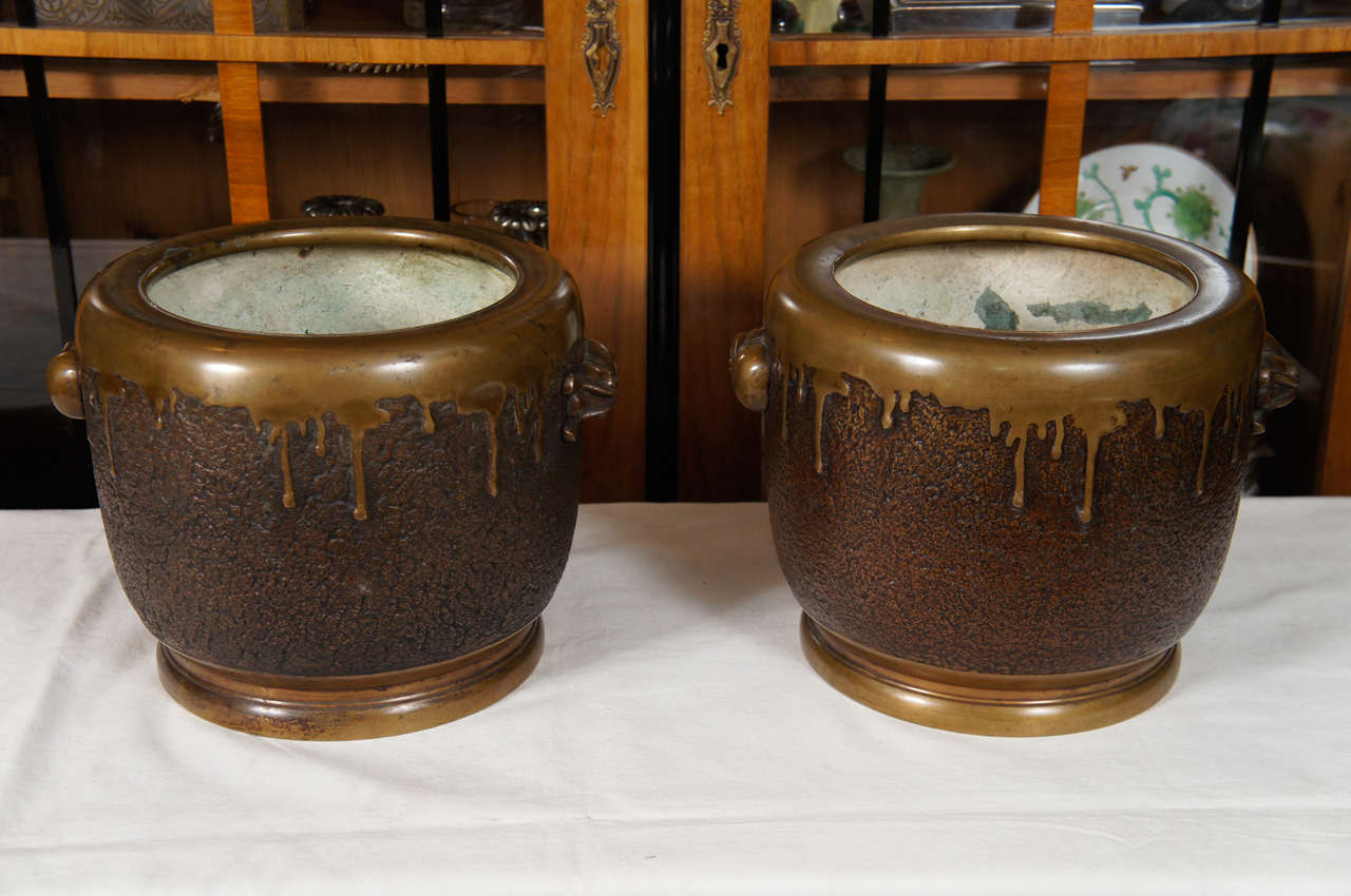 Pair of bronze Japanese hibachis with drips. Excellent patina.
