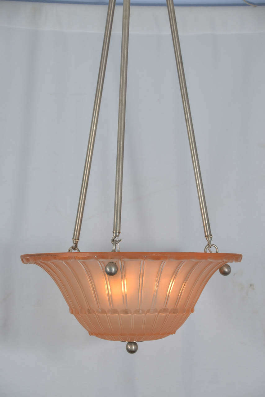 Large, pink Art Deco bowl chandelier, with satin nickel plating over brass hardware. Three lights within the bowl. Will accommodate up to 100 in each bulb. Price reduced from $3600 to $3200.