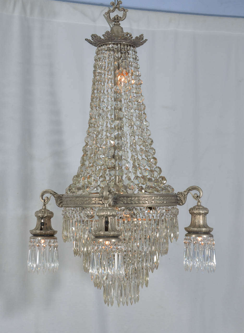 Beautiful, eight-light, crystal chandelier, priced at $2500. Reduced from $3500.