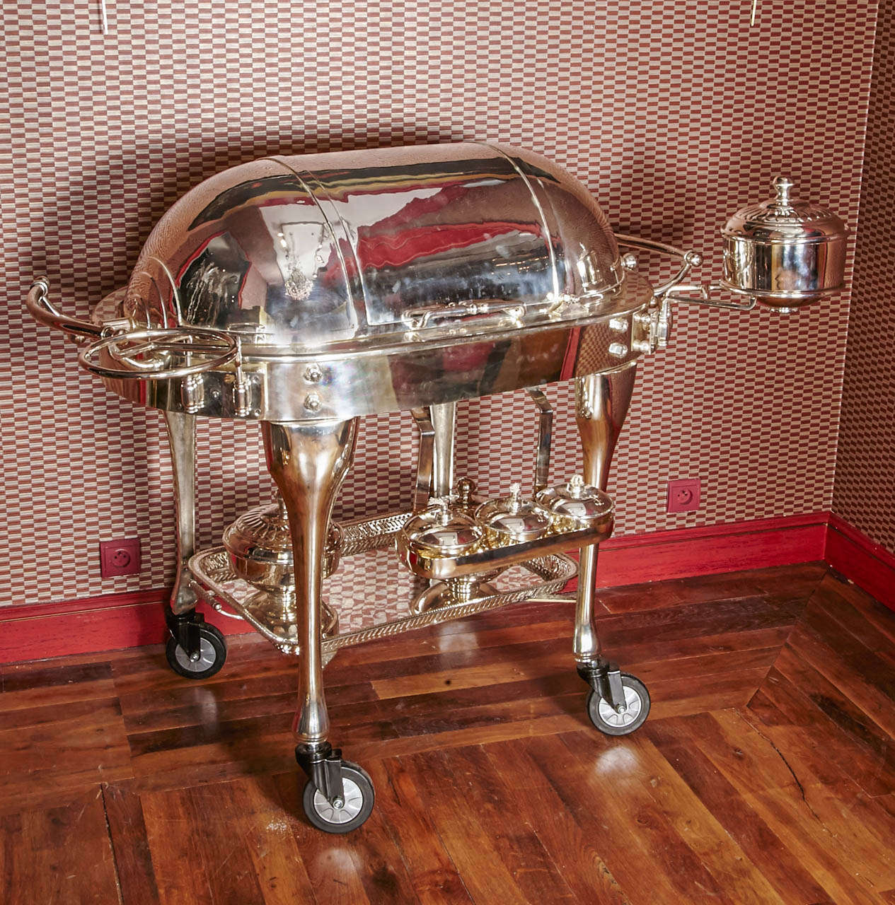 Silver-plated meat-serving trolley on casters, including 3 burners and 3 sauce boats, from a Parisian mansion.