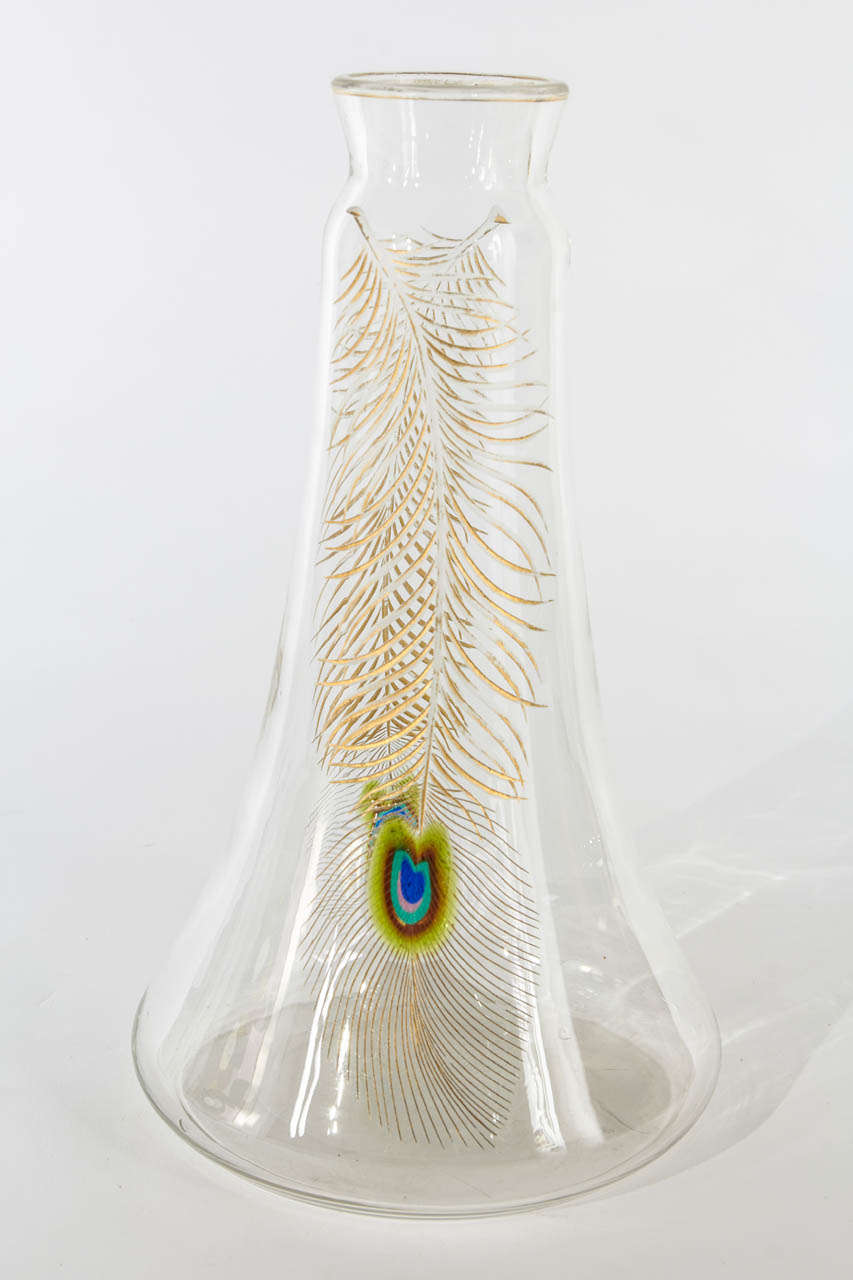 JOSEF RIEDEL GLASWERKS  Dolni Polubny, Bohemia 
E. BAKALOWITS SÖHNE  Vienna   

Carafe c. 1900

Clear crystal engraved with a peacock feather (gilding) 
and inset with an applied colored-glass peacock eye

For more information see: Das