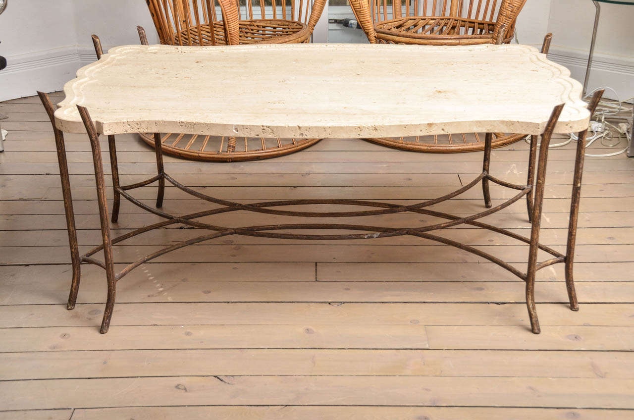Faux-bois iron base limestone top coffee table. Table platform height of 20.5