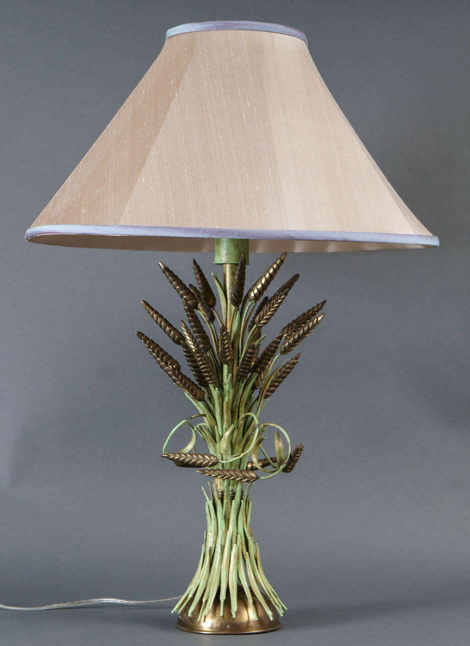Single brass and green painted tole wheat shef lamp
23 inches to the top of the socket.