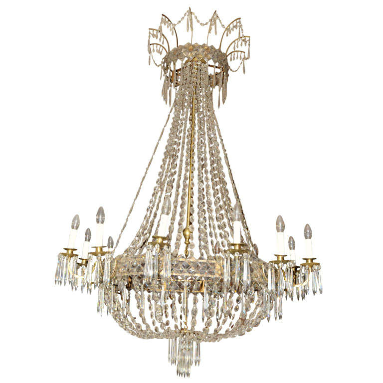 A large 19th century French Neoclassical brass and cut glass chandelier